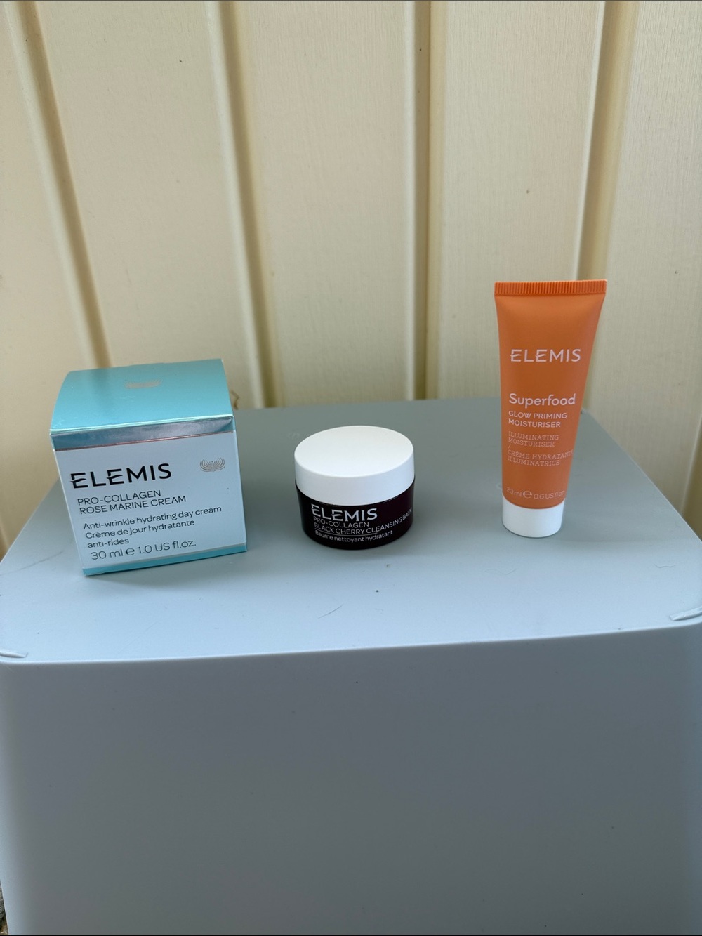ELEMIS teal, white, orange skincare trio